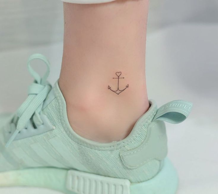 Tiny anchor on the side of foot